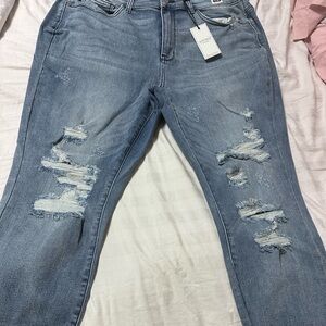 NWT Judy blue mid rise skinny fit. Raw bottom. Distressed